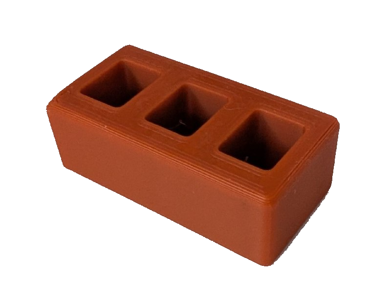Photo of the orange 3D-printed mini-brick donors receive as a thank-you